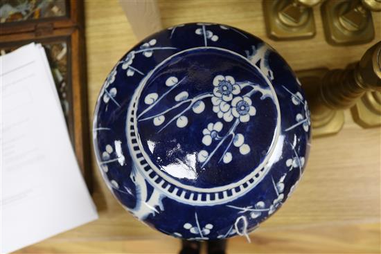 A Chinese large bulbous ginger jar and cover decorated prunus